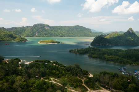Scenic aerial view of the green mountains and river in KILIM Park on a sunny day with a clear sky. Langkawi. Malaysiaの写真素材