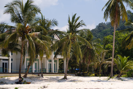 REDANG ISLAND, MALAYSIA - July 29, 2025. Beautiful view of Long Beach and an abandoned hotel along the waterfrontのeditorial素材