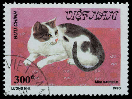 VIETNAM - CIRCA 1990: A stamp printed in Vietnam, shows cat, circa 1990のeditorial素材