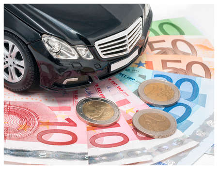 Euro banknotes and coins to buy or lease a new carのeditorial素材