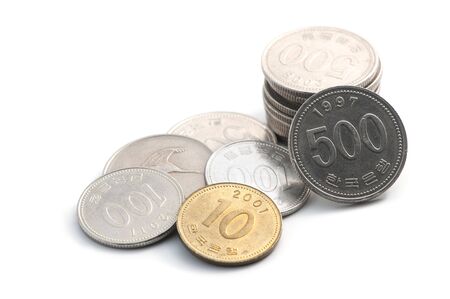 Pile of Korean coins isolated on white backgroundの写真素材
