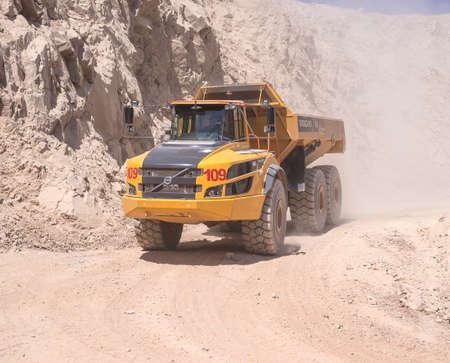 Almaty, Kazakhstan - May 20, 2019: Volvo A45GF articulated yellow dump truck in the mine.のeditorial素材