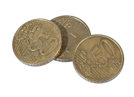50 cent coins close up on white background