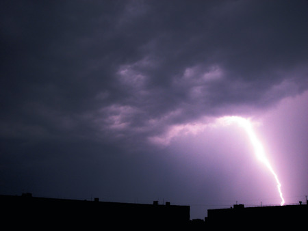 A discharge of the lightning on the violet sky