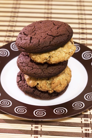 homemade cookies laid out on a stack of saucerの写真素材