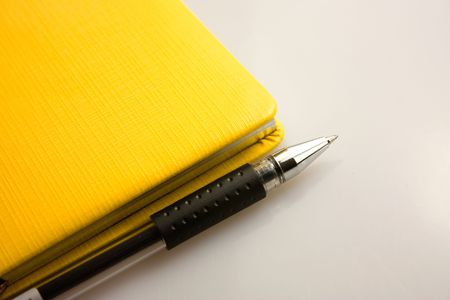 Notebook and penの写真素材