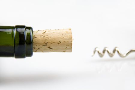 Bottle Openers and wine placed on a white background の写真素材