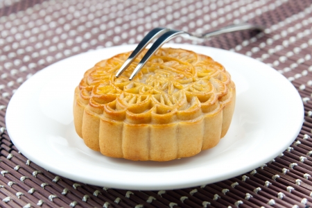 A moon cake on a plateの写真素材