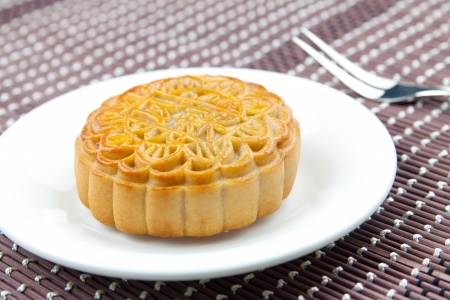A moon cake on a plateの写真素材