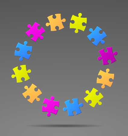 Colorful puzzle in a circle on a gray backgroundの写真素材
