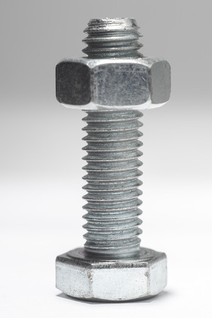 bolt nut washer on white  background isolatedの写真素材