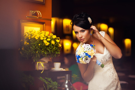 Stylish Autumn wedding a beautiful bride and brave groomの写真素材