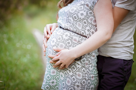 A young pregnant woman waiting for a baby