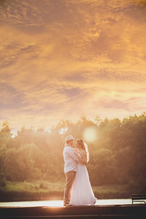 Bride at sunset on the nature in summerの写真素材