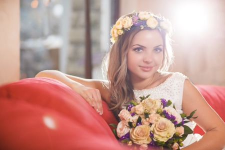 red sofa bride smile flowerの写真素材