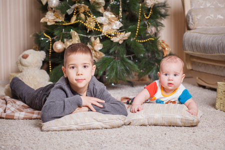 portrait of hugging little brothersの写真素材