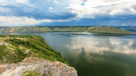 view of the river from a high bankの写真素材