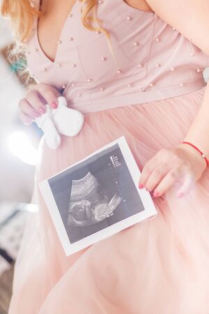 pregnant woman new year indoorの写真素材