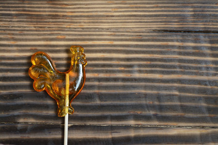 Lollipop on the wooden backgroundの写真素材