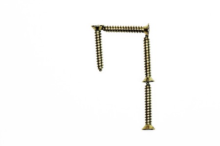 Number '7' made of screw  isolated on white 