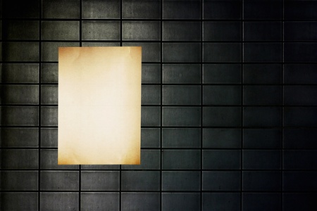 Grunge vintage old paper on dark wallの写真素材