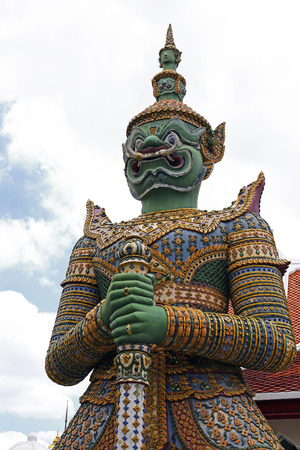 Demon Guardian statues decorating the Buddhist temple Wat Arun in Bangkok, Thailandの写真素材