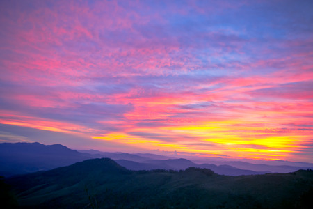 Sunset over the twilight cloud and sky background,colorful dramatic skyの写真素材