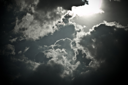 Sky background with the fluffy white clouds