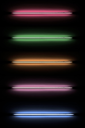 Detail of a fluorescent light tube mounted on a wall
