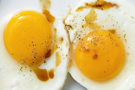 Organic Chicken Eggs Being Friedの写真素材