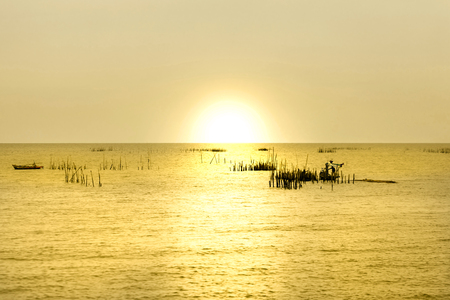 Sunset on the beach with beautiful skyの写真素材