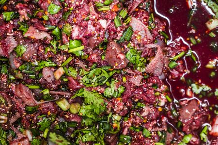 Raw beef spicy minced meat salad, Northeastern Thailand local food.の写真素材