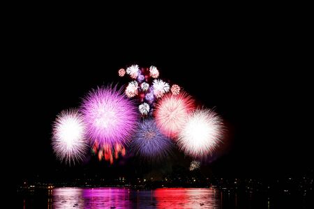 Colorful fireworks over dark skyの写真素材