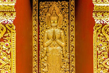 Angels on the walls of the templeの写真素材