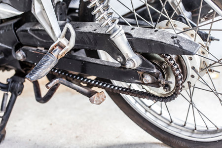 Chains and exhaust of old motorcyclesの写真素材