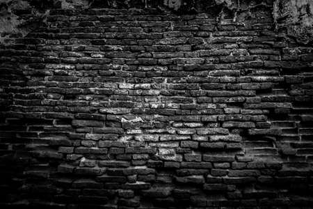 cracked concrete vintage brick wall backgroundの写真素材