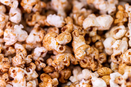 Bowl of popcorn isolatated on a white backgroundの写真素材