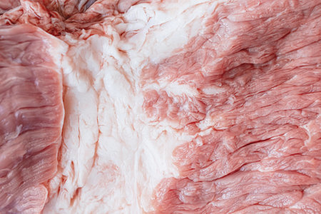 Raw pork meat background. Top view. Raw pork meat texture.