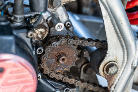Close-up of the chain of a motorcycle with a chain drive.の写真素材