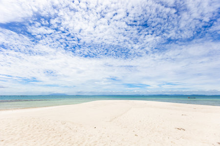 White sand beach and blue sky with white clouds at Koh Samui, Thailandの写真素材