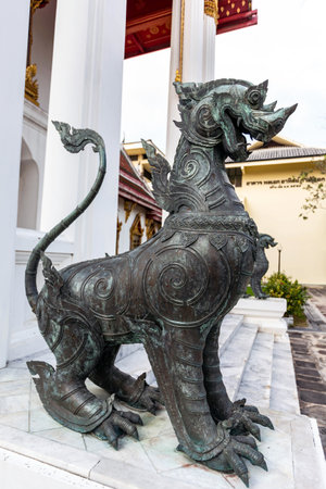 Bronze lion statue in Wat Phra Kaew, Bangkok, Thailand