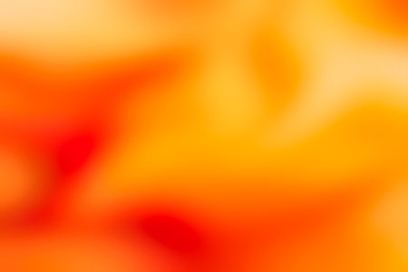 Abstract blurred orange background with bokeh effect. Texture for your design