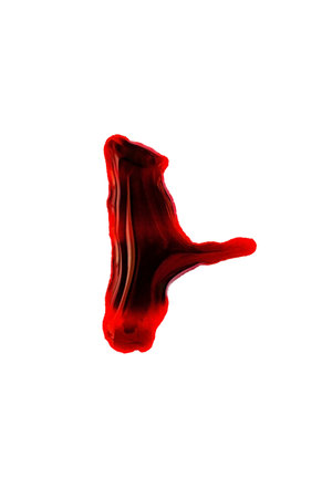 Red paint splash isolated on white background. Top view. Flat lay.