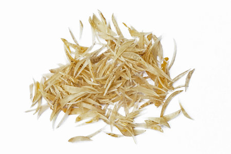 Dried shredded pork isolated on white background. Close-up.