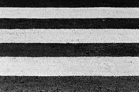 Zebra crossing on the road. Black and white. Abstract background.の写真素材