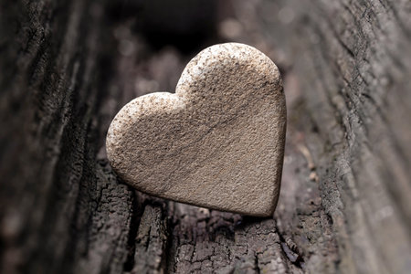 Stone heart on the wooden background. Valentine's day. Love.の写真素材