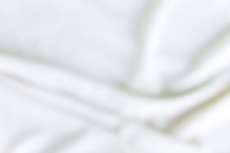 Blurred white fabric background. Abstract background of white fabric texture.の写真素材
