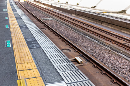 Railway tracks on a platform in a train station in Hong Kong