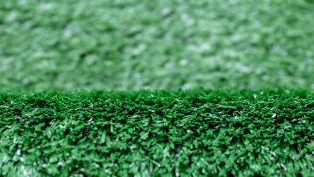 Soccer Field Line Closeup. Green artificial grass texture background.の写真素材
