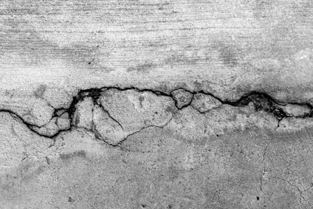 Cracks on the cement floor. Abstract background and texture for design.
